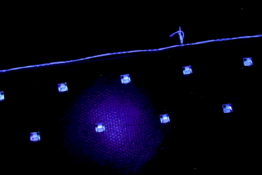 Black light project - UV-reactive rhinestones, day and black light, created by Invenio Flory for Saint Laurent