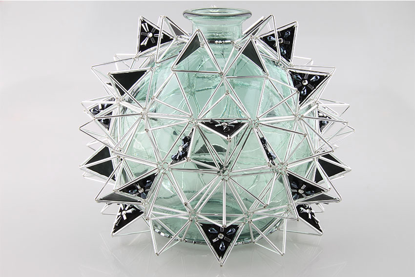 Demijohn covering in glass-tube chainmail and embroidery